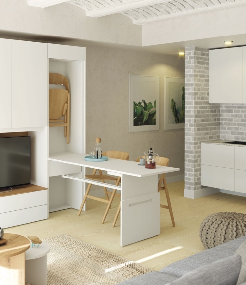 Table pliante ROLL, qui s'étend pour être utilisée comme table à manger.