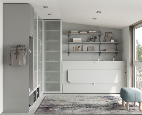 Chambre d'adolescent avec un lit escamotable.